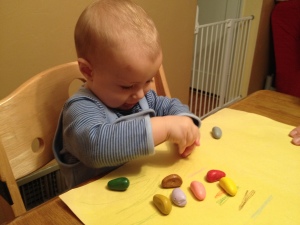 Nathaniel coloring with Crayon Rocks.