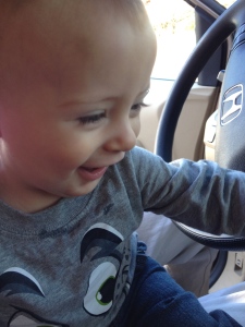 Nathaniel having fun in the car.