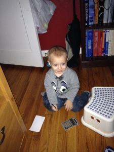 Nathaniel playing on the floor.