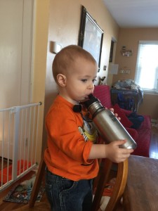 Nathaniel with Max's water bottle