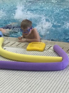 Max kicking in swim class. 