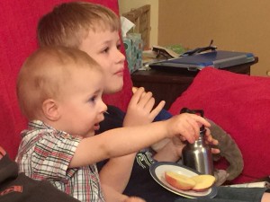 The boys watching a car show!