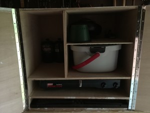 Room for a grill (for over open fire pit), stove, sink, lantern (not shown) and other needed things.