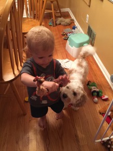 Nathaniel eating a chicken leg