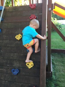 Surprise! I am climbing the rock wall!